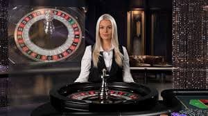 Live dealer studio with multiple camera angles showing Jewels of Prosperity tables